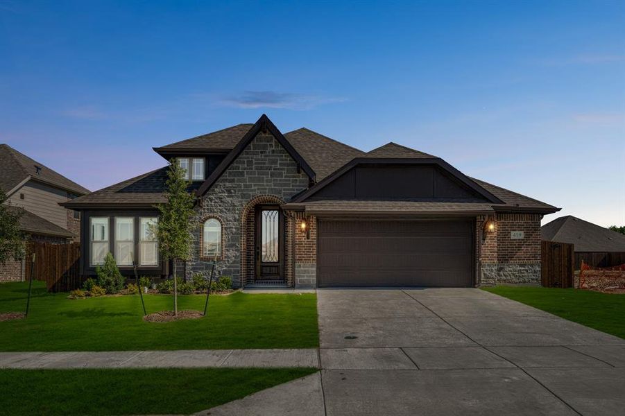 Front exterior of a new home in Maplewood, Glenn Heights, TX, highlighting curb appeal (Image 20).