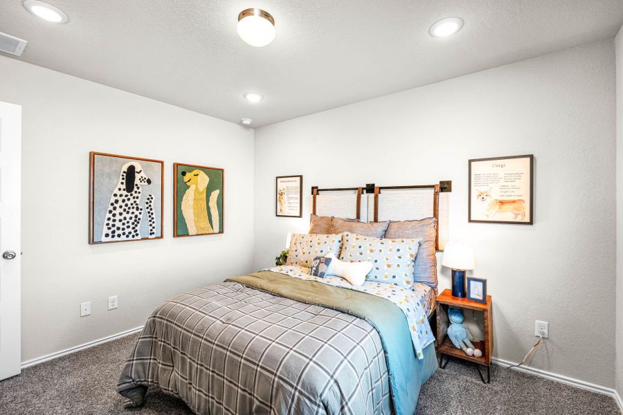 These are the secondary bedrooms of the Hawkins plan and is the model home in Carillon at 13305 Eppright Trace Blvd., Manor, TX. These are the secondary bedrooms of the Hawkins plan and is the model home in Carillon at 13305 Eppright Trace Blvd., Manor, TX.