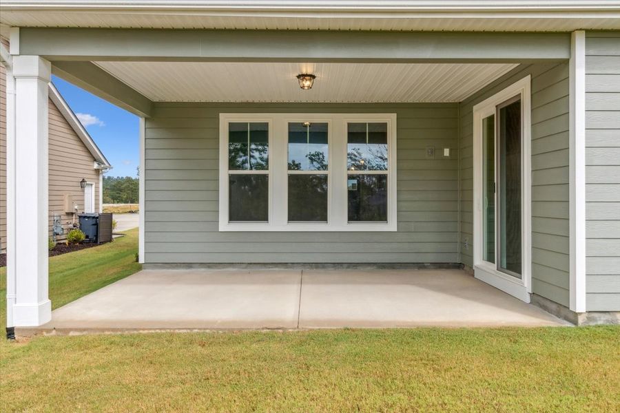 Exterior details and patio area of a home in Sinclair at Crawford Creek, Grovetown (Image 26).