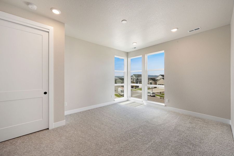 Spacious, unfurnished interior of a new home in Kitchel Lake at Serratoga Falls, Timnath (Image 13).