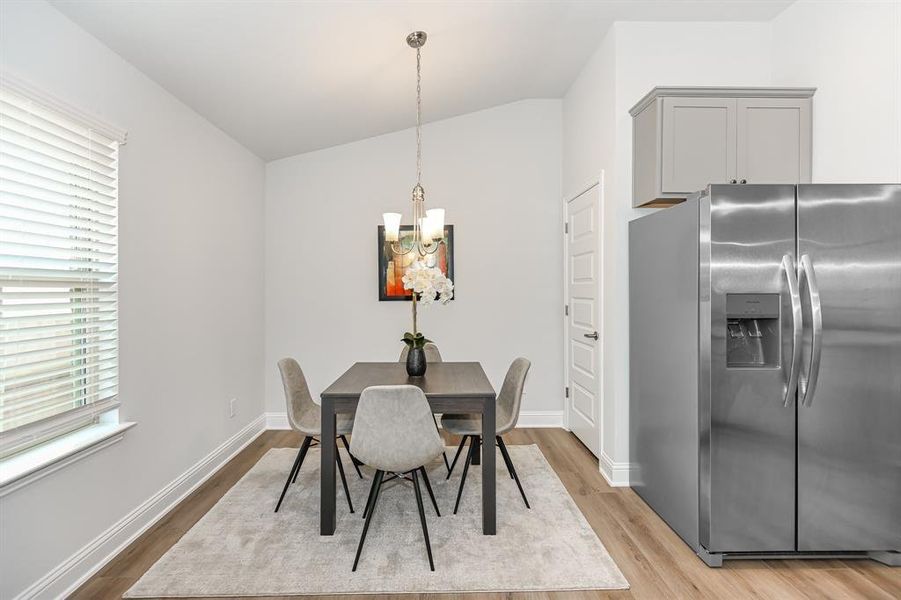 Breakfast area just off of the kitchen  *Stock Photo- Finishes and colors may vary