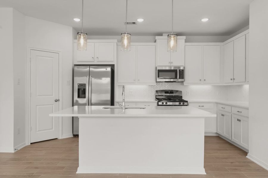 Representative furnished interior of a home built from the Chalet by Chesmar Homes in Woodforest, Montgomery (Image 3).
