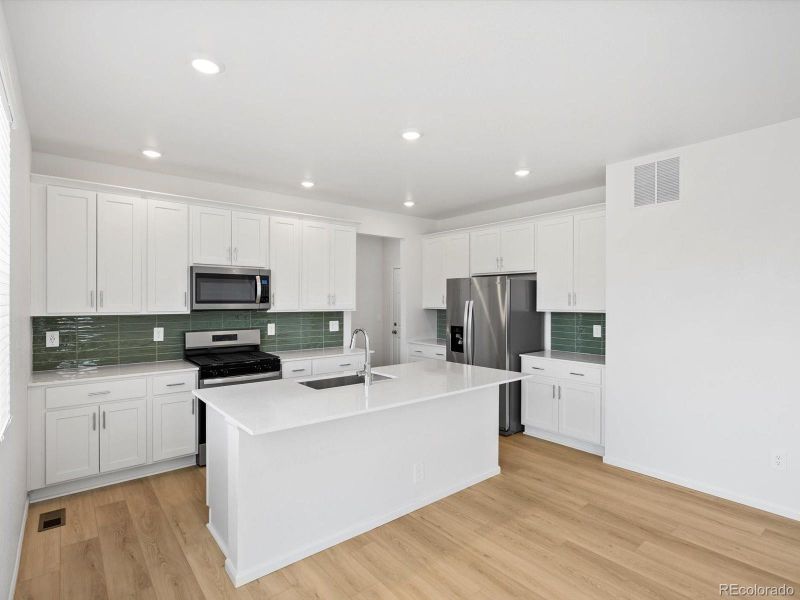 Furnished interior view inside a new home in Poudre Heights: The Lakes Collection, Windsor (Image 6).