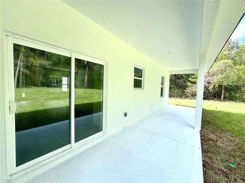 Exterior details and patio area of a home in , Citrus Springs (Image 19).