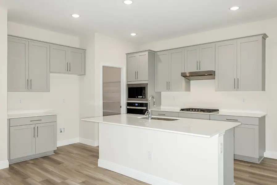 Furnished interior view inside a new home in Pasadena Woods, Wesley Chapel (Image 5). Furnished interior view inside a new home in Pasadena Woods, Wesley Chapel (Image 5).