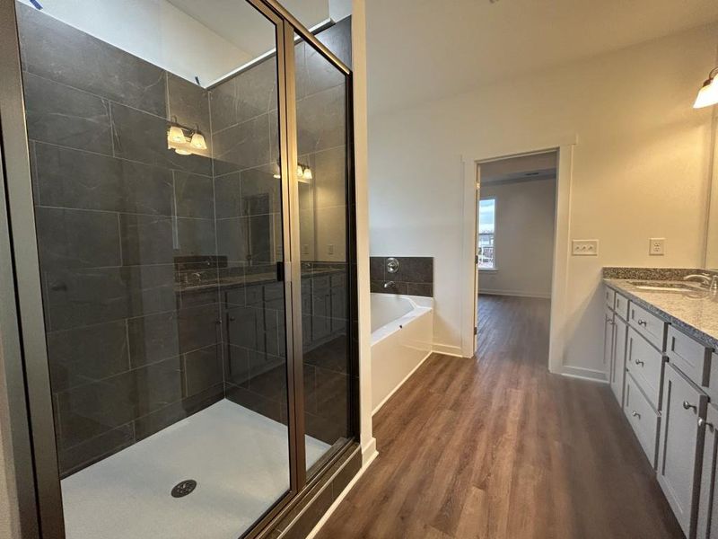 Furnished interior view inside a new home in Sutton's Landing, Statham (Image 9).