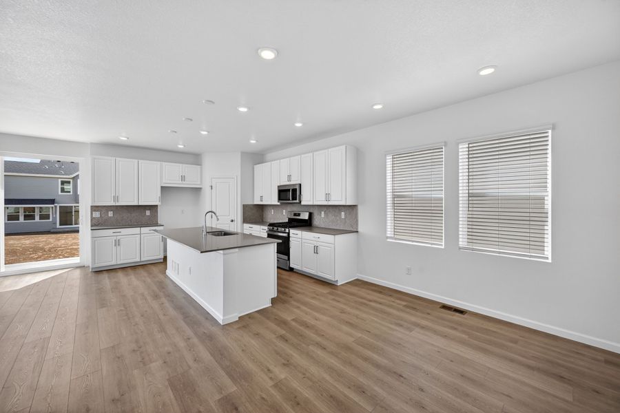 Furnished interior view inside a new home in Sky Ranch, Aurora (Image 3).