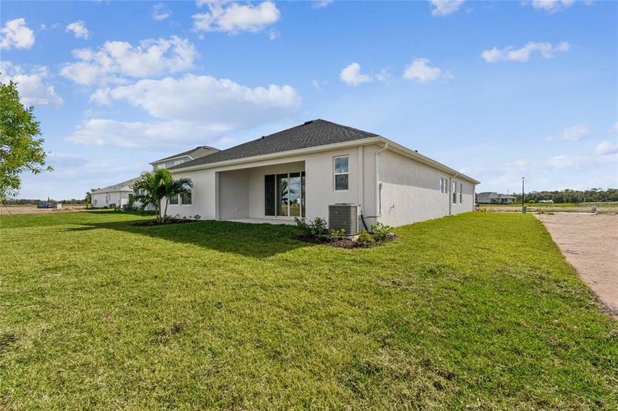 Exterior details and patio area of a home in Coasterra, Palmetto (Image 28).