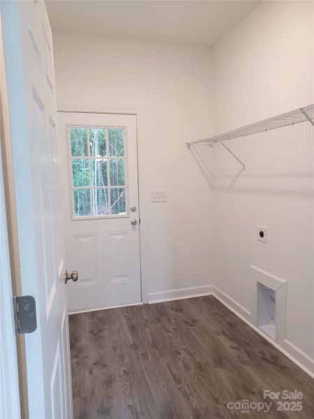 Laundry Room leads to back door opening onto covered rear porch