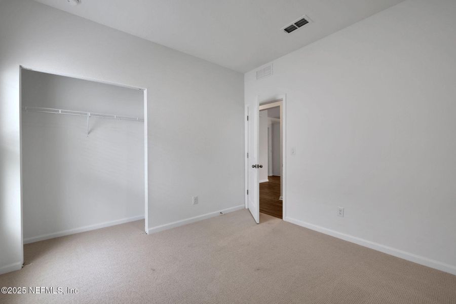 Spacious, unfurnished interior of a new home in Cordova Palms, St. Augustine (Image 37).