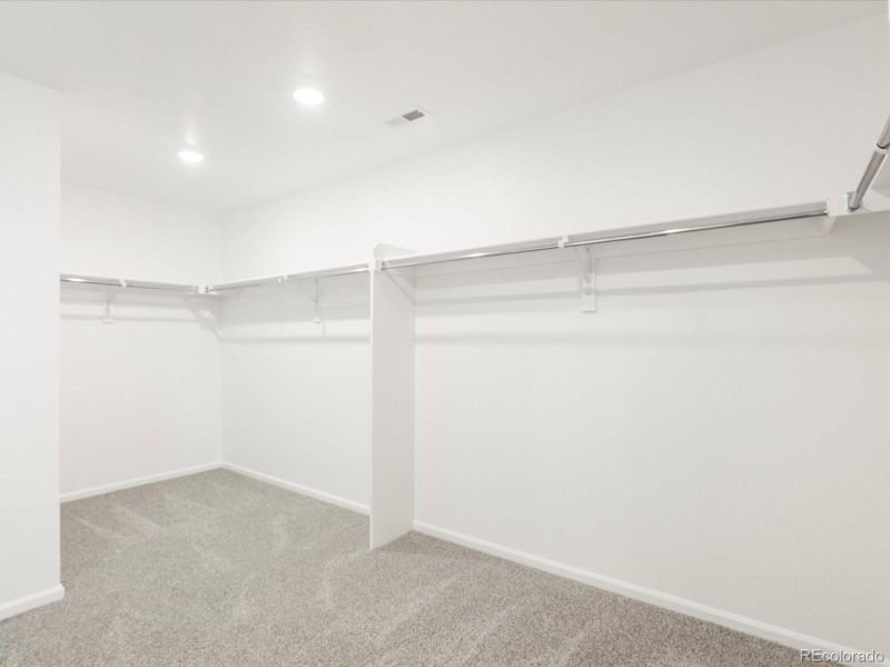 Spacious, unfurnished interior of a new home in Ridgeline Vista: The Flora Collection, Brighton (Image 18).