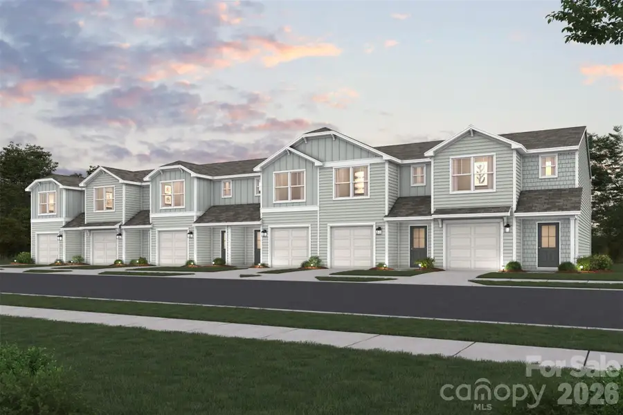 Front exterior of a new home in Ellison Townhomes, Spartanburg, SC, highlighting curb appeal (Image 1). Front exterior of a new home in Ellison Townhomes, Spartanburg, SC, highlighting curb appeal (Image 1).