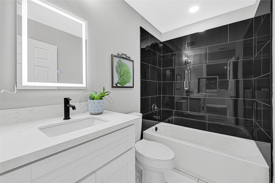 Secondary full bath with luxury finishes