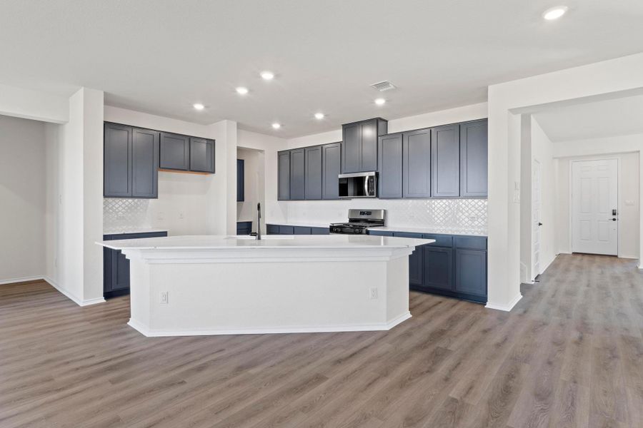 Furnished interior view inside a new home in Salerno - Classic Collection, Round Rock (Image 10). Furnished interior view inside a new home in Salerno - Classic Collection, Round Rock (Image 10).