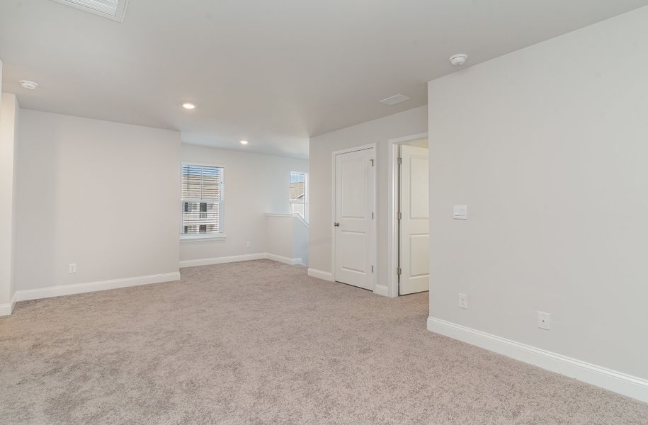 Representative unfurnished interior of a home built from the BELFORT by D.R. Horton in Brunswick Plantation, Calabash (Image 20).