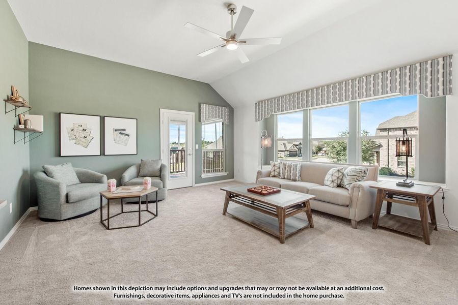Living room with vaulted ceiling, ceiling fan, large windows, and neutral carpet Living room with vaulted ceiling, ceiling fan, large windows, and neutral carpet