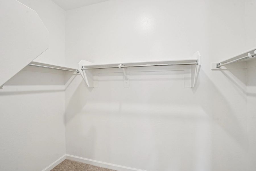 Primary walk in closet Primary walk in closet