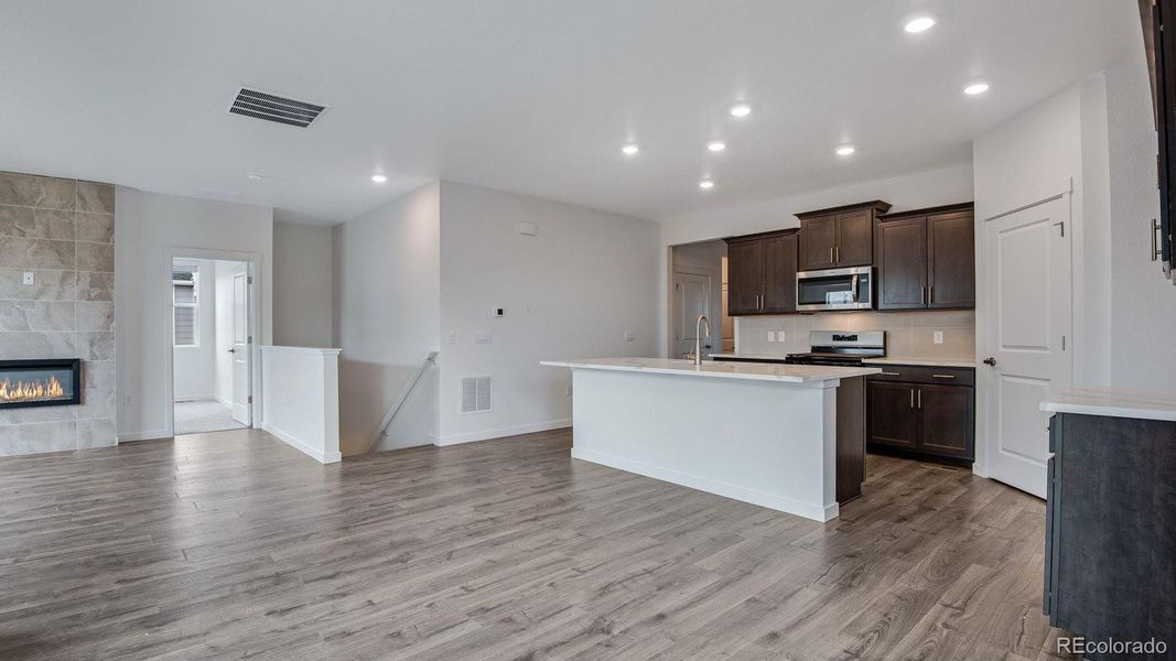 Furnished interior view inside a new home in Trails at Crowfoot, Parker (Image 8).