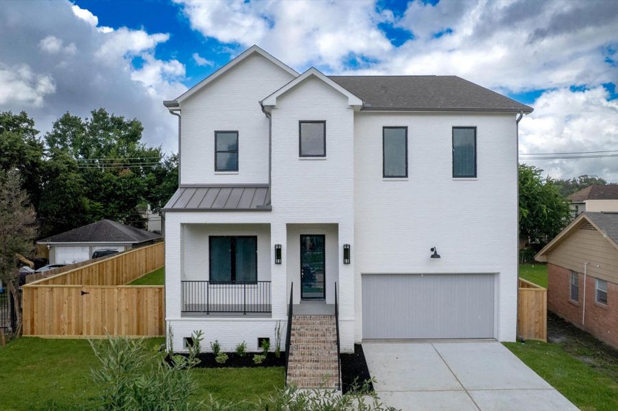 Showcasing the homes elevated design and spacious driveway. Showcasing the homes elevated design and spacious driveway.