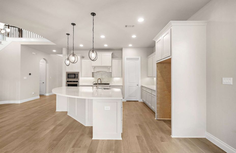 Representative furnished interior of a home built from the 3070 by Ravenna Homes in The Highlands 55′, Porter (Image 13).