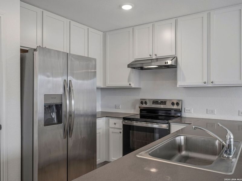 Furnished interior view inside a new home in Mission del Lago, San Antonio (Image 6).