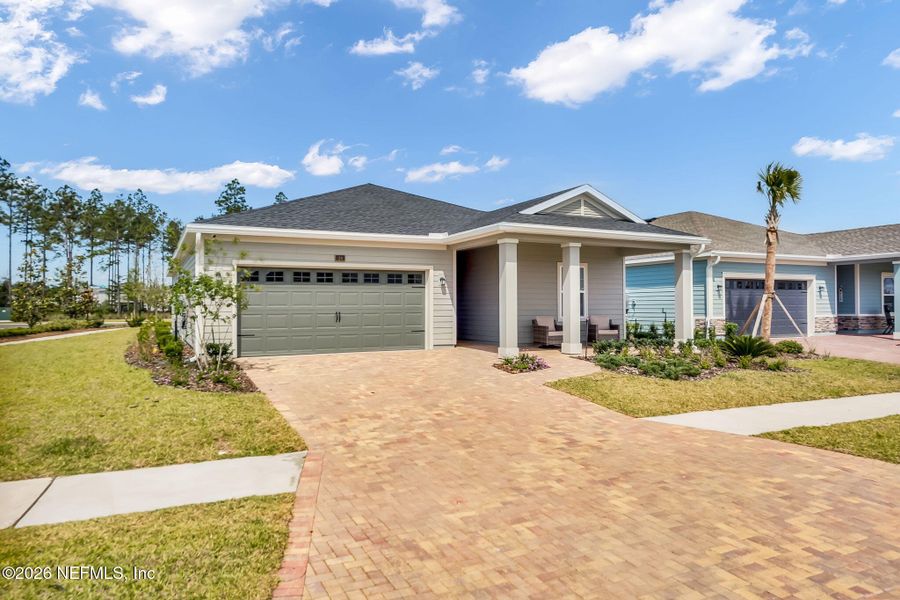 Front exterior of a new home in Shearwater, St. Augustine, FL, highlighting curb appeal (Image 2). Front exterior of a new home in Shearwater, St. Augustine, FL, highlighting curb appeal (Image 2).