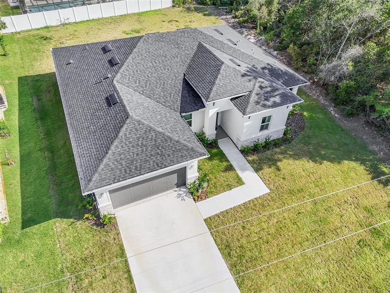 Front exterior of a new home in , Palm Coast, FL, highlighting curb appeal (Image 25).