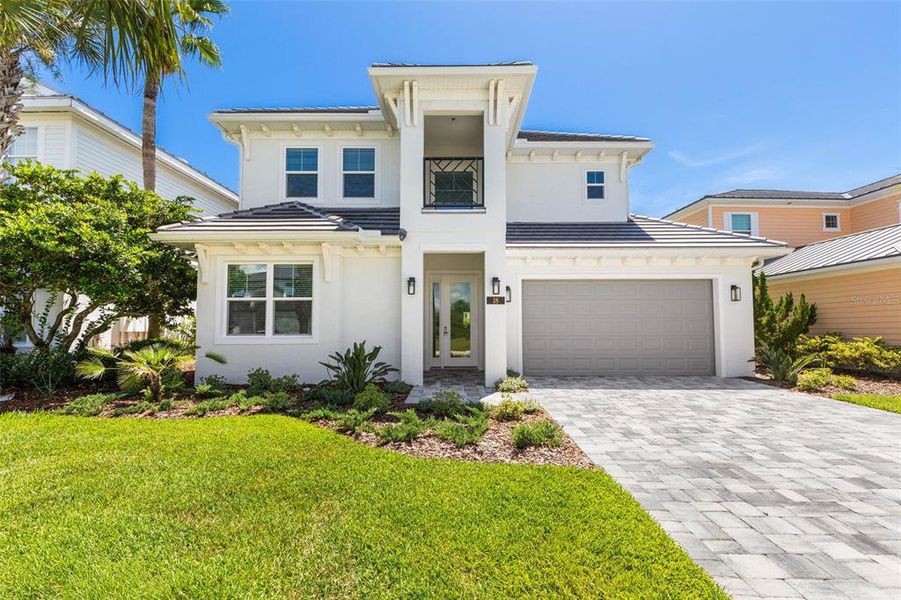 Front exterior of a new home in , Palm Coast, FL, highlighting curb appeal (Image 26). Front exterior of a new home in , Palm Coast, FL, highlighting curb appeal (Image 26).