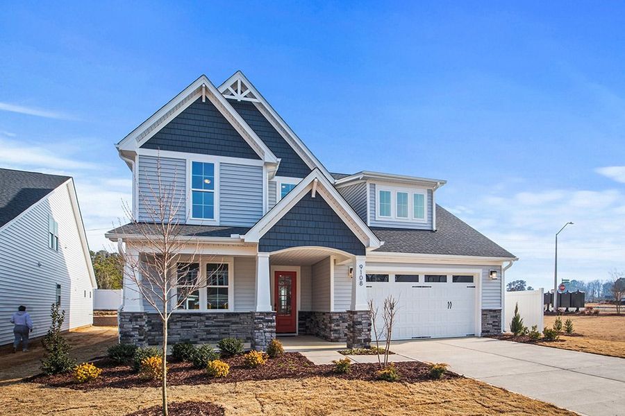 Representative exterior photo of a completed home built from the The Whitley by RobuckHomes in Kennebec Crossing, Angier, NC (Image 36). Representative exterior photo of a completed home built from the The Whitley by RobuckHomes in Kennebec Crossing, Angier, NC (Image 36).