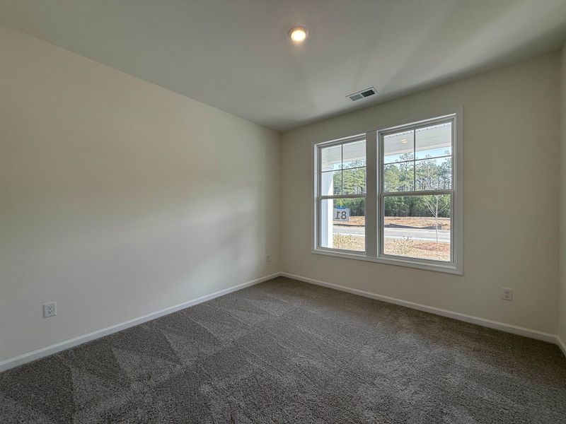 Spacious, unfurnished interior of a new home in Westwood Reserve, Conway (Image 26).