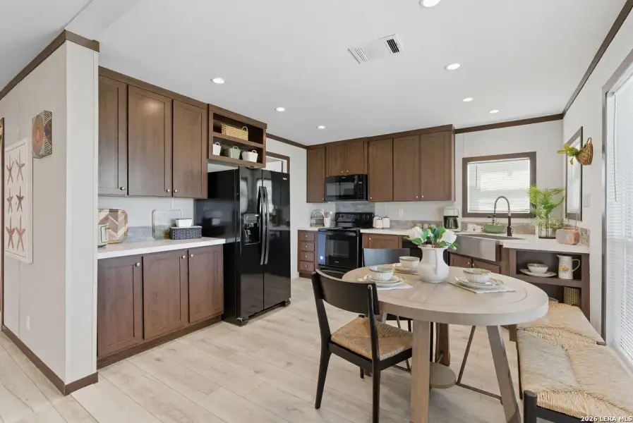 Furnished interior view inside a new home in , Seguin (Image 8).