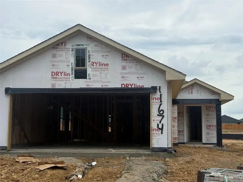 In-progress construction of a new home in Lexington Heights, Willis, TX (Image 9).