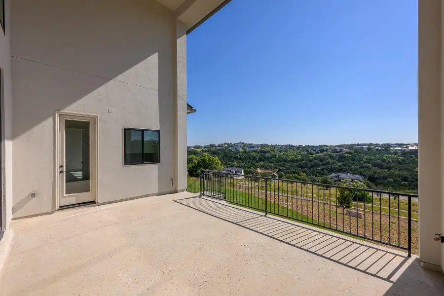 Exterior details and patio area of a home in Rough Hollow, Austin (Image 3). Exterior details and patio area of a home in Rough Hollow, Austin (Image 3).
