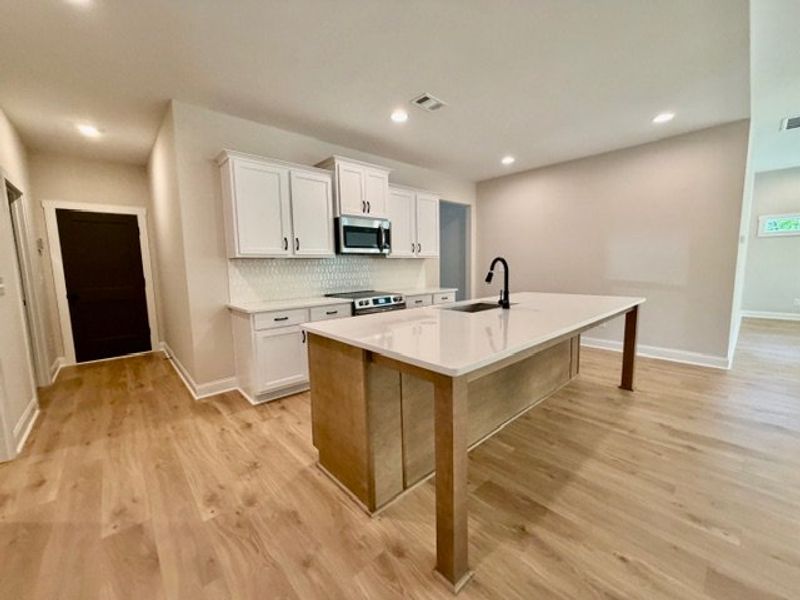 Furnished interior view inside a new home in Deer Creek, Moreland (Image 4).