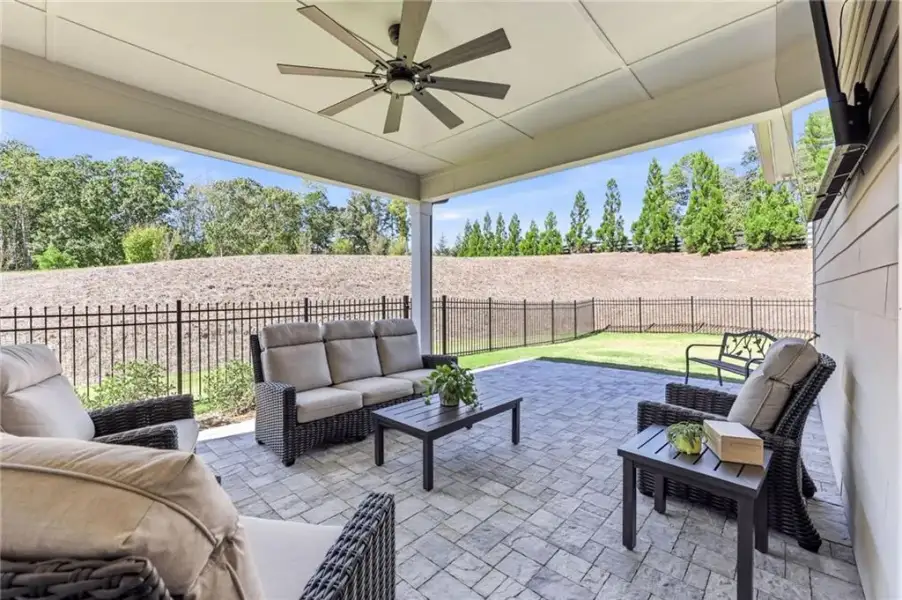 Exterior details and patio area of a home in The Retreat at Sterling on the Lake 48', Flowery Branch (Image 27).