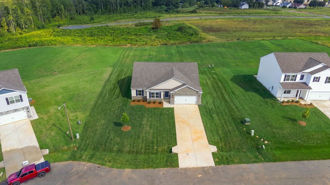 Exterior details and patio area of a home in Beaver Dam Crossing, Bailey (Image 19).