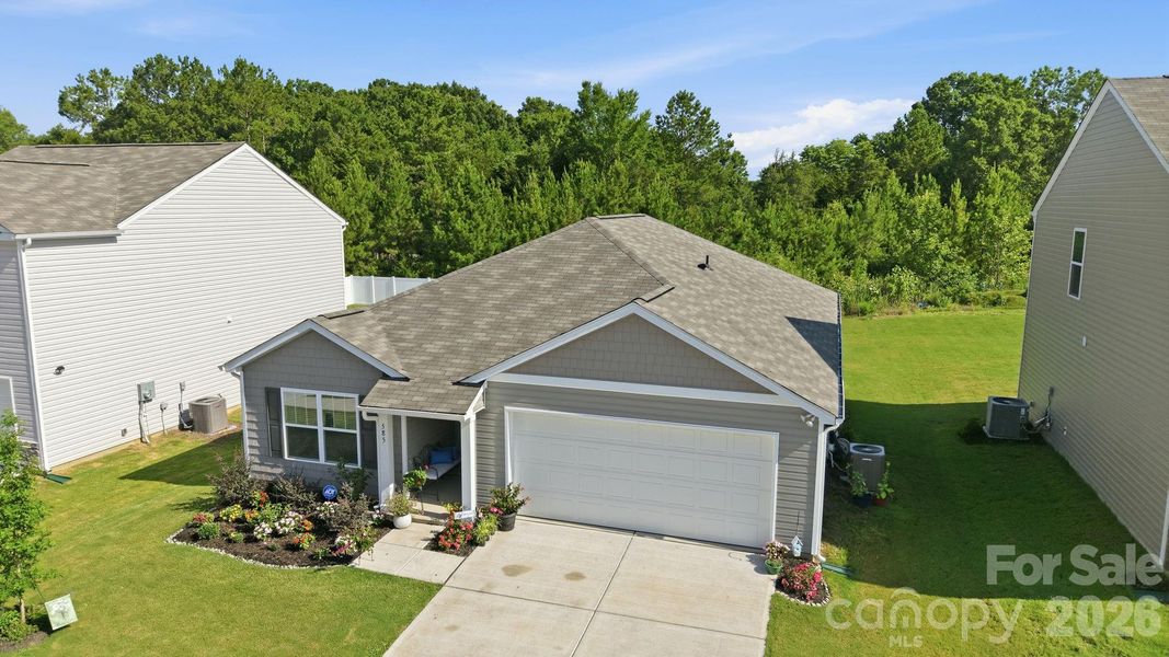 Front exterior of a new home in Woodhaven at Chester, Chester, SC, highlighting curb appeal (Image 23).