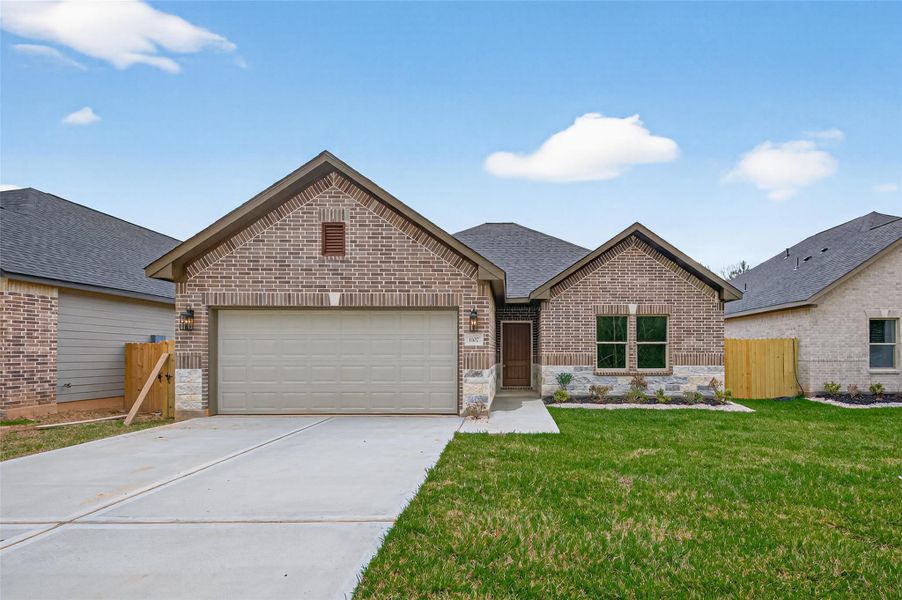 Front exterior of a new home in , Cleveland, TX, highlighting curb appeal (Image 20).