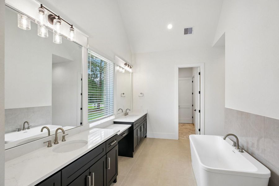 Furnished interior view inside a new home in Homestead Hill, New Waverly (Image 6).