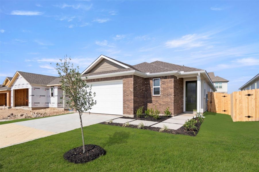 Front exterior of a new home in The Enclave at Hidden Oaks, Georgetown, TX, highlighting curb appeal (Image 20). Front exterior of a new home in The Enclave at Hidden Oaks, Georgetown, TX, highlighting curb appeal (Image 20).