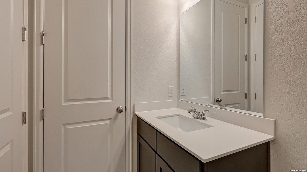 Furnished interior view inside a new home in Ladera, San Antonio (Image 15).
