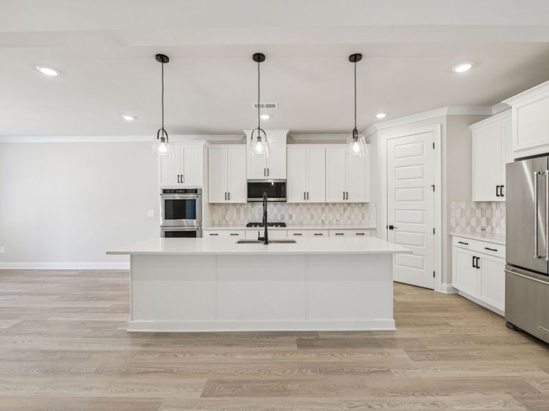 Furnished interior view inside a new home in Vines at Mill Creek - Legacy Series, Braselton (Image 6). Furnished interior view inside a new home in Vines at Mill Creek - Legacy Series, Braselton (Image 6).