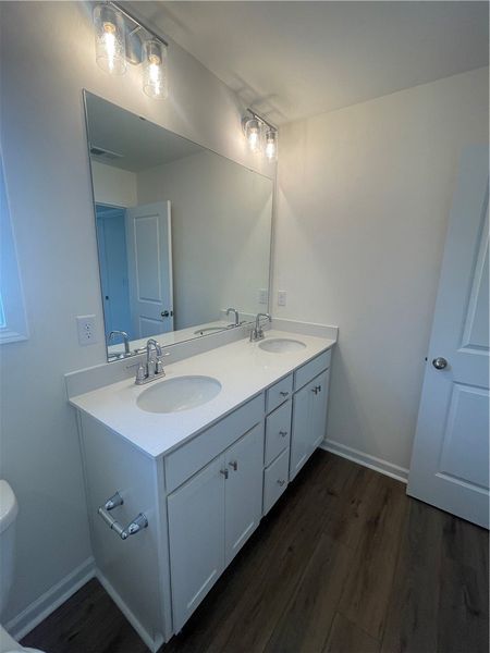 Furnished interior view inside a new home in Springwood Grove, Central (Image 8).