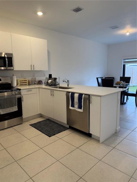 Furnished interior view inside a new home in , Miami (Image 3).