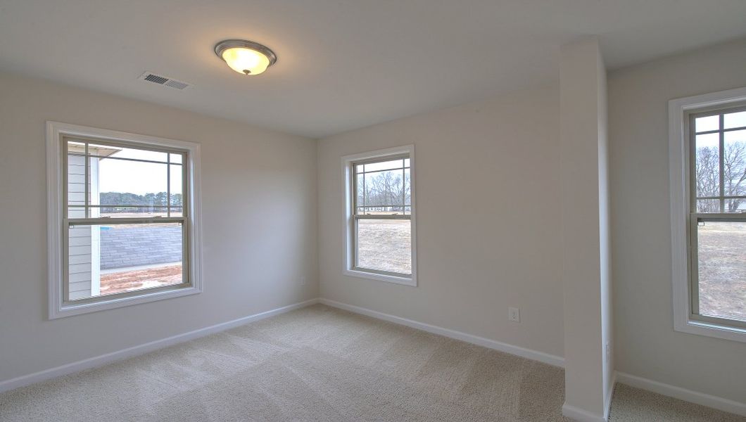 Spacious, unfurnished interior of a new home in Reserve at Tap Root Farms, Fletcher (Image 29).