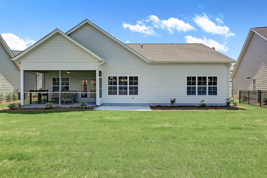 Representative exterior photo of a completed home built from the Lanai by Bill Clark Homes in The Sanctuary at Sunset Beach, Sunset Beach, NC (Image 26). Representative exterior photo of a completed home built from the Lanai by Bill Clark Homes in The Sanctuary at Sunset Beach, Sunset Beach, NC (Image 26).
