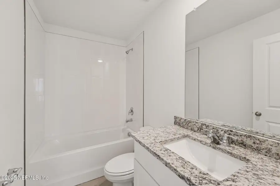 Furnished interior view inside a new home in Flagler Village - Classic Series, Palm Coast (Image 14). Furnished interior view inside a new home in Flagler Village - Classic Series, Palm Coast (Image 14).