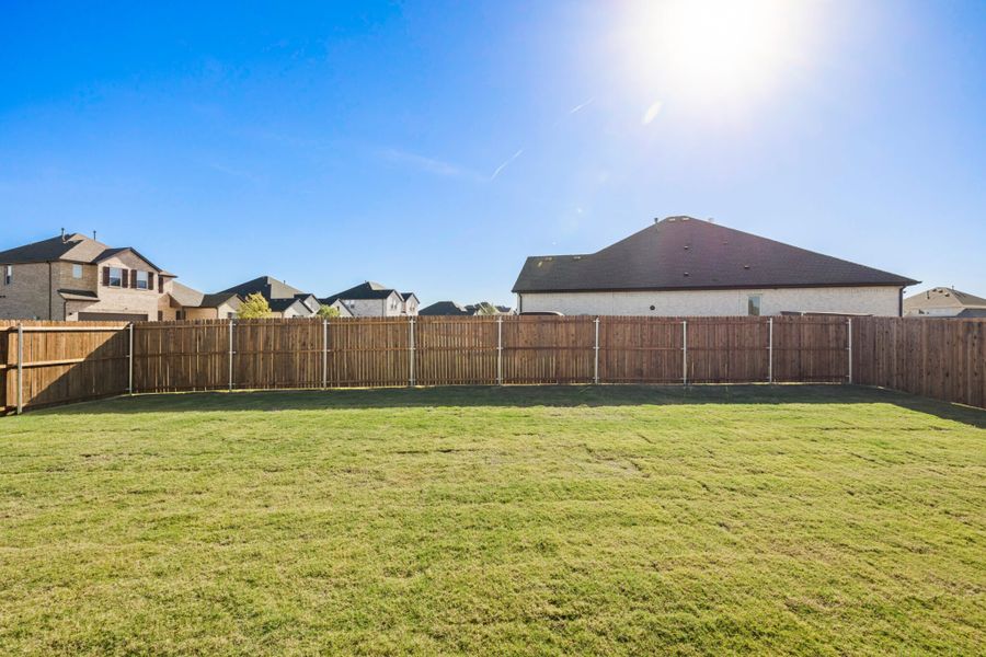 Exterior details and patio area of a home in Lake Breeze, Lavon (Image 25).