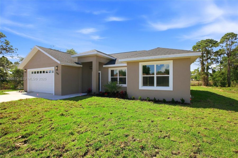 Front exterior of a new home in , Lake Placid, FL, highlighting curb appeal (Image 17).