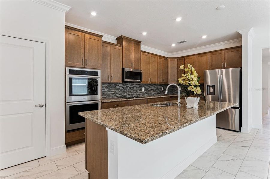 Furnished interior view inside a new home in Villa Pass, Mascotte (Image 7). Furnished interior view inside a new home in Villa Pass, Mascotte (Image 7).